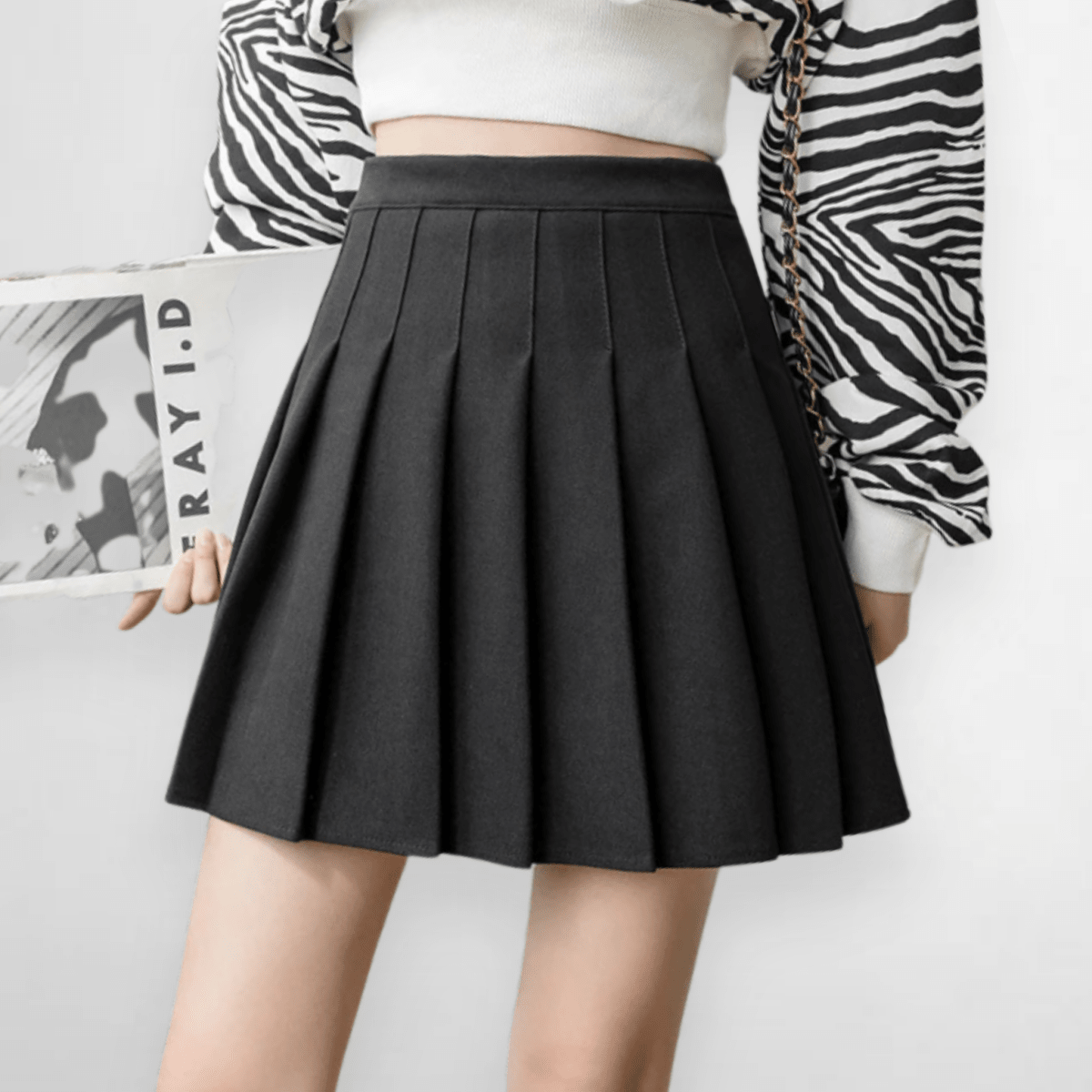 Velora Kensington Plisovaná Mini Sukně | Skirts | Elora Praha