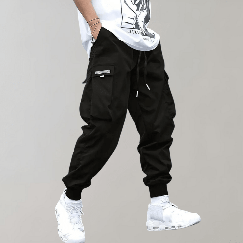 Tomáš – Pánské Cargo Joggingové Kalhoty – Fialové Streetwear Kalhoty s Kapsami na Zip a Náplety | | Elora Praha