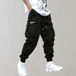 Tomáš – Pánské Cargo Joggingové Kalhoty – Fialové Streetwear Kalhoty s Kapsami na Zip a Náplety | | Elora Praha