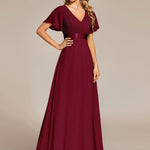 MONICA | Dlouhé šaty pro družičky s empírovým pasem a krátkými volánkovými rukávy | Bridesmaid Dresses | Elora Praha
