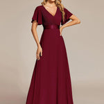 MONICA | Dlouhé šaty pro družičky s empírovým pasem a krátkými volánkovými rukávy | Bridesmaid Dresses | Elora Praha