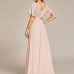 MONICA | Dlouhé šaty pro družičky s empírovým pasem a krátkými volánkovými rukávy | Bridesmaid Dresses | Elora Praha