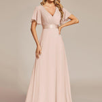 MONICA | Dlouhé šaty pro družičky s empírovým pasem a krátkými volánkovými rukávy | Bridesmaid Dresses | Elora Praha