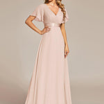 MONICA | Dlouhé šaty pro družičky s empírovým pasem a krátkými volánkovými rukávy | Bridesmaid Dresses | Elora Praha