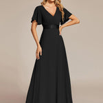 MONICA | Dlouhé šaty pro družičky s empírovým pasem a krátkými volánkovými rukávy | Bridesmaid Dresses | Elora Praha