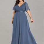 MONICA | Dlouhé šaty pro družičky s empírovým pasem a krátkými volánkovými rukávy | Bridesmaid Dresses | Elora Praha