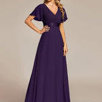 MONICA | Dlouhé šaty pro družičky s empírovým pasem a krátkými volánkovými rukávy | Bridesmaid Dresses | Elora Praha