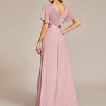 MONICA | Dlouhé šaty pro družičky s empírovým pasem a krátkými volánkovými rukávy | Bridesmaid Dresses | Elora Praha