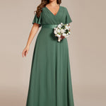 MONICA | Dlouhé šaty pro družičky s empírovým pasem a krátkými volánkovými rukávy | Bridesmaid Dresses | Elora Praha