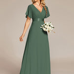 MONICA | Dlouhé šaty pro družičky s empírovým pasem a krátkými volánkovými rukávy | Bridesmaid Dresses | Elora Praha