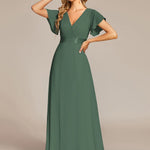 MONICA | Dlouhé šaty pro družičky s empírovým pasem a krátkými volánkovými rukávy | Bridesmaid Dresses | Elora Praha