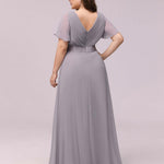 MONICA | Dlouhé šaty pro družičky s empírovým pasem a krátkými volánkovými rukávy | Bridesmaid Dresses | Elora Praha
