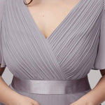 MONICA | Dlouhé šaty pro družičky s empírovým pasem a krátkými volánkovými rukávy | Bridesmaid Dresses | Elora Praha