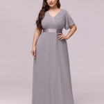 MONICA | Dlouhé šaty pro družičky s empírovým pasem a krátkými volánkovými rukávy | Bridesmaid Dresses | Elora Praha
