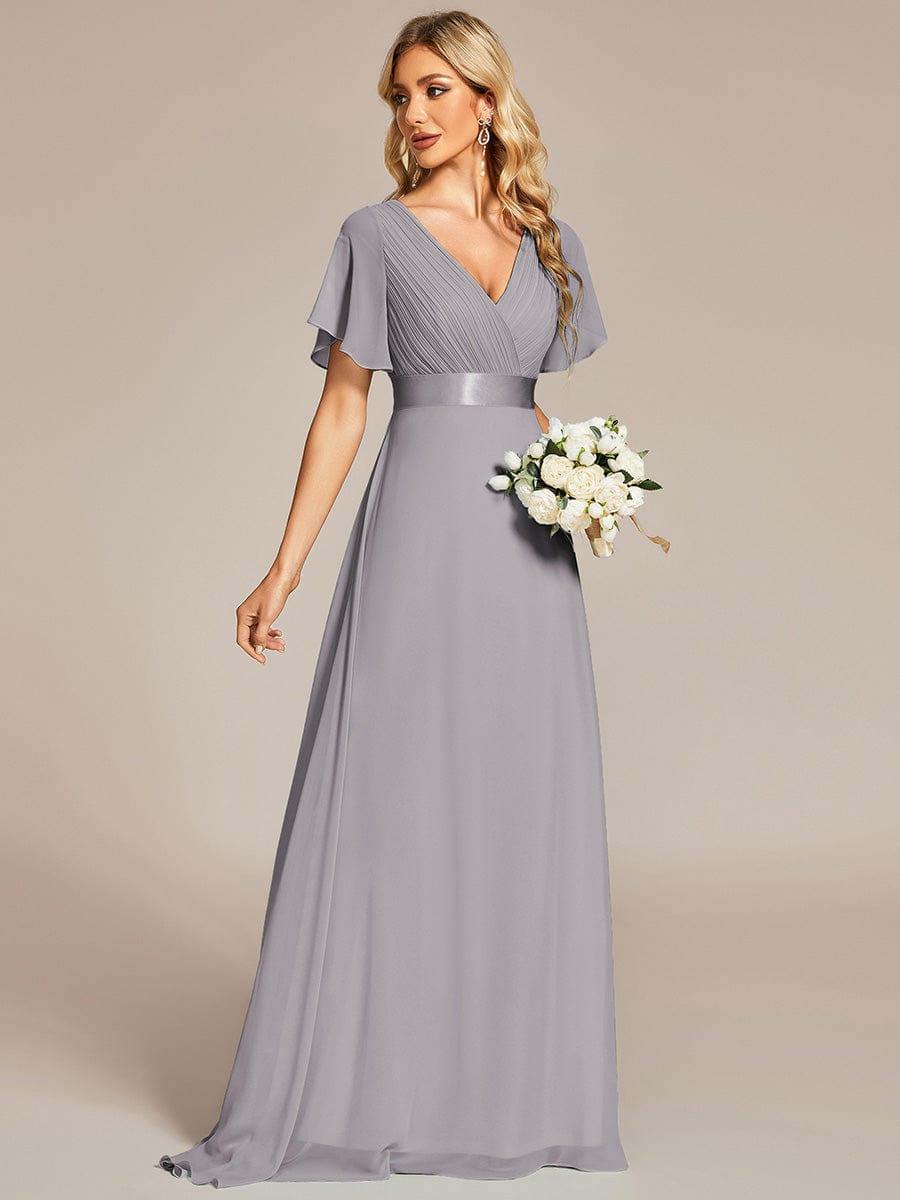 MONICA | Dlouhé šaty pro družičky s empírovým pasem a krátkými volánkovými rukávy | Bridesmaid Dresses | Elora Praha