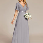 MONICA | Dlouhé šaty pro družičky s empírovým pasem a krátkými volánkovými rukávy | Bridesmaid Dresses | Elora Praha