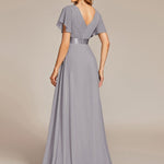 MONICA | Dlouhé šaty pro družičky s empírovým pasem a krátkými volánkovými rukávy | Bridesmaid Dresses | Elora Praha