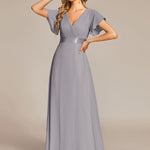MONICA | Dlouhé šaty pro družičky s empírovým pasem a krátkými volánkovými rukávy | Bridesmaid Dresses | Elora Praha