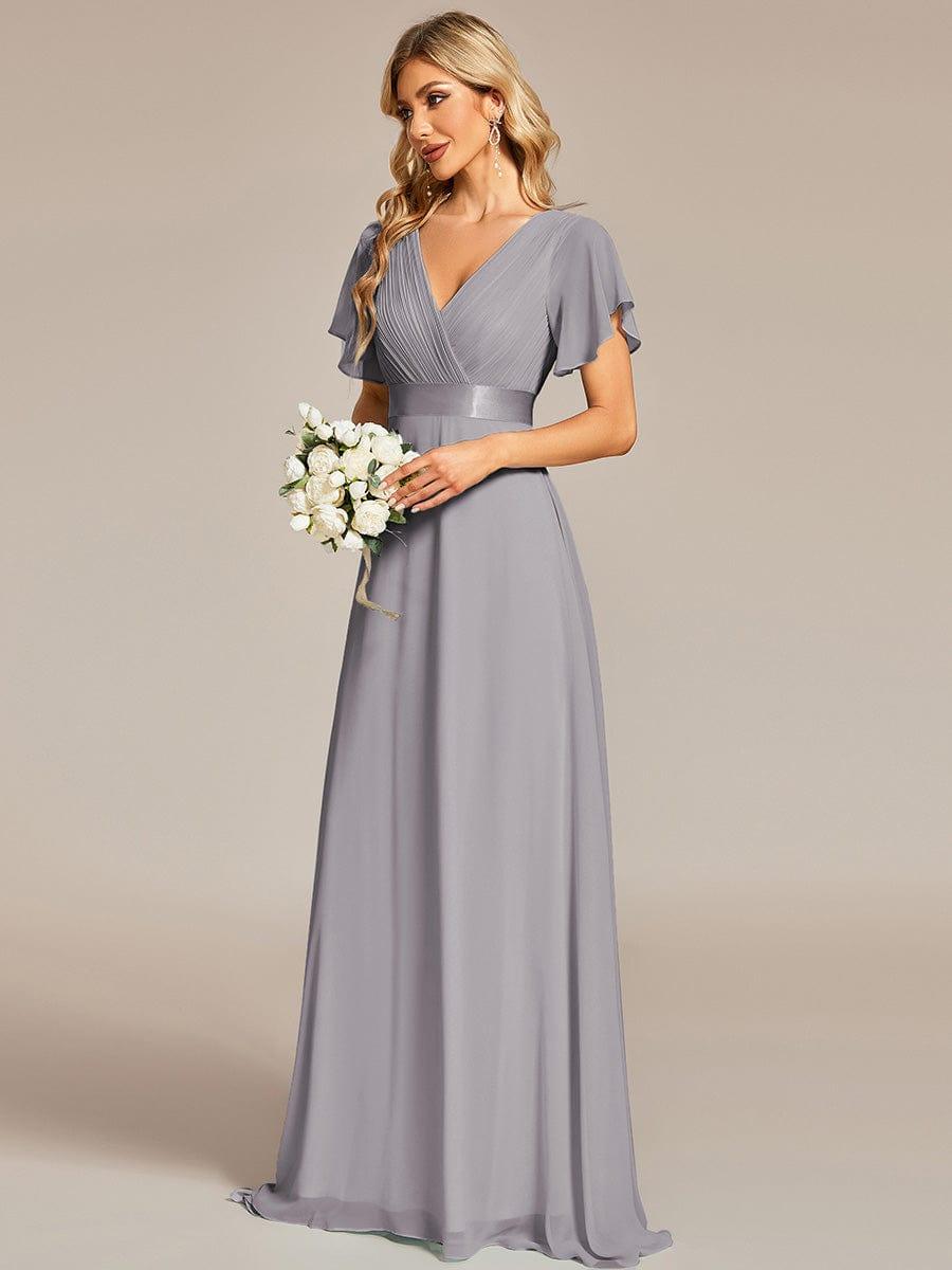 MONICA | Dlouhé šaty pro družičky s empírovým pasem a krátkými volánkovými rukávy | Bridesmaid Dresses | Elora Praha
