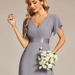 MONICA | Dlouhé šaty pro družičky s empírovým pasem a krátkými volánkovými rukávy | Bridesmaid Dresses | Elora Praha