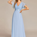 MONICA | Dlouhé šaty pro družičky s empírovým pasem a krátkými volánkovými rukávy | Bridesmaid Dresses | Elora Praha