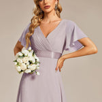 MONICA | Dlouhé šaty pro družičky s empírovým pasem a krátkými volánkovými rukávy | Bridesmaid Dresses | Elora Praha