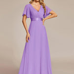 MONICA | Dlouhé šaty pro družičky s empírovým pasem a krátkými volánkovými rukávy | Bridesmaid Dresses | Elora Praha