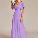 MONICA | Dlouhé šaty pro družičky s empírovým pasem a krátkými volánkovými rukávy | Bridesmaid Dresses | Elora Praha