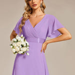 MONICA | Dlouhé šaty pro družičky s empírovým pasem a krátkými volánkovými rukávy | Bridesmaid Dresses | Elora Praha