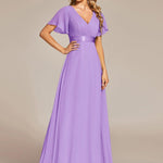 MONICA | Dlouhé šaty pro družičky s empírovým pasem a krátkými volánkovými rukávy | Bridesmaid Dresses | Elora Praha