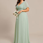 MONICA | Dlouhé šaty pro družičky s empírovým pasem a krátkými volánkovými rukávy | Bridesmaid Dresses | Elora Praha