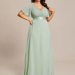 MONICA | Dlouhé šaty pro družičky s empírovým pasem a krátkými volánkovými rukávy | Bridesmaid Dresses | Elora Praha