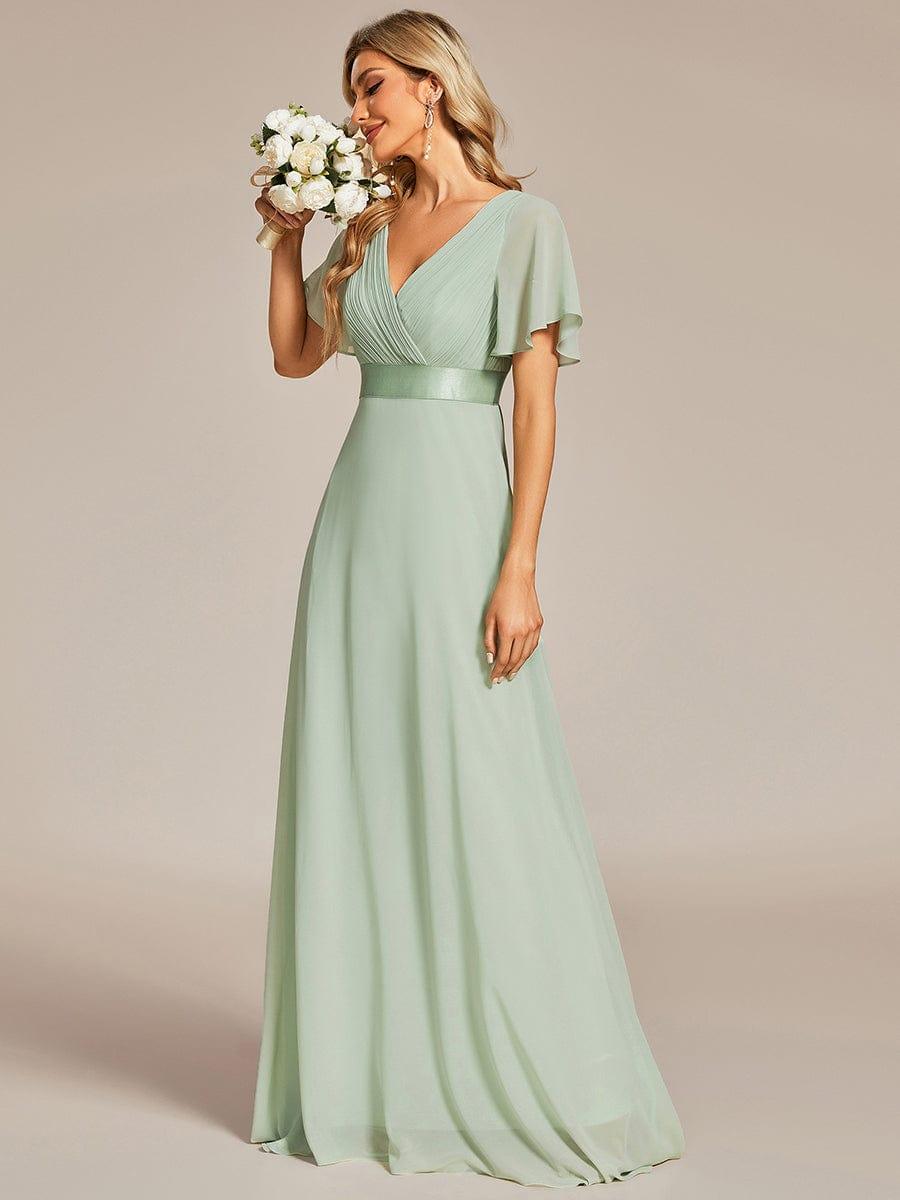 MONICA | Dlouhé šaty pro družičky s empírovým pasem a krátkými volánkovými rukávy | Bridesmaid Dresses | Elora Praha