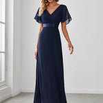 MONICA | Dlouhé šaty pro družičky s empírovým pasem a krátkými volánkovými rukávy | Bridesmaid Dresses | Elora Praha