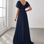 MONICA | Dlouhé šaty pro družičky s empírovým pasem a krátkými volánkovými rukávy | Bridesmaid Dresses | Elora Praha