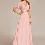 MONICA | Dlouhé šaty pro družičky s empírovým pasem a krátkými volánkovými rukávy | Bridesmaid Dresses | Elora Praha