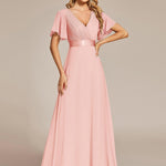 MONICA | Dlouhé šaty pro družičky s empírovým pasem a krátkými volánkovými rukávy | Bridesmaid Dresses | Elora Praha