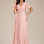 MONICA | Dlouhé šaty pro družičky s empírovým pasem a krátkými volánkovými rukávy | Bridesmaid Dresses | Elora Praha