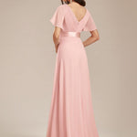 MONICA | Dlouhé šaty pro družičky s empírovým pasem a krátkými volánkovými rukávy | Bridesmaid Dresses | Elora Praha