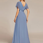 MONICA | Dlouhé šaty pro družičky s empírovým pasem a krátkými volánkovými rukávy | Bridesmaid Dresses | Elora Praha