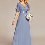 MONICA | Dlouhé šaty pro družičky s empírovým pasem a krátkými volánkovými rukávy | Bridesmaid Dresses | Elora Praha