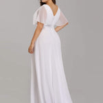 MONICA | Dlouhé šaty pro družičky s empírovým pasem a krátkými volánkovými rukávy | Bridesmaid Dresses | Elora Praha