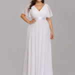 MONICA | Dlouhé šaty pro družičky s empírovým pasem a krátkými volánkovými rukávy | Bridesmaid Dresses | Elora Praha