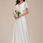 MONICA | Dlouhé šaty pro družičky s empírovým pasem a krátkými volánkovými rukávy | Bridesmaid Dresses | Elora Praha