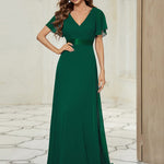 MONICA | Dlouhé šaty pro družičky s empírovým pasem a krátkými volánkovými rukávy | Bridesmaid Dresses | Elora Praha