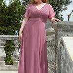 MONICA | Dlouhé šaty pro družičky s empírovým pasem a krátkými volánkovými rukávy | Bridesmaid Dresses | Elora Praha