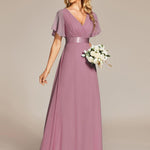 MONICA | Dlouhé šaty pro družičky s empírovým pasem a krátkými volánkovými rukávy | Bridesmaid Dresses | Elora Praha