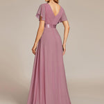 MONICA | Dlouhé šaty pro družičky s empírovým pasem a krátkými volánkovými rukávy | Bridesmaid Dresses | Elora Praha